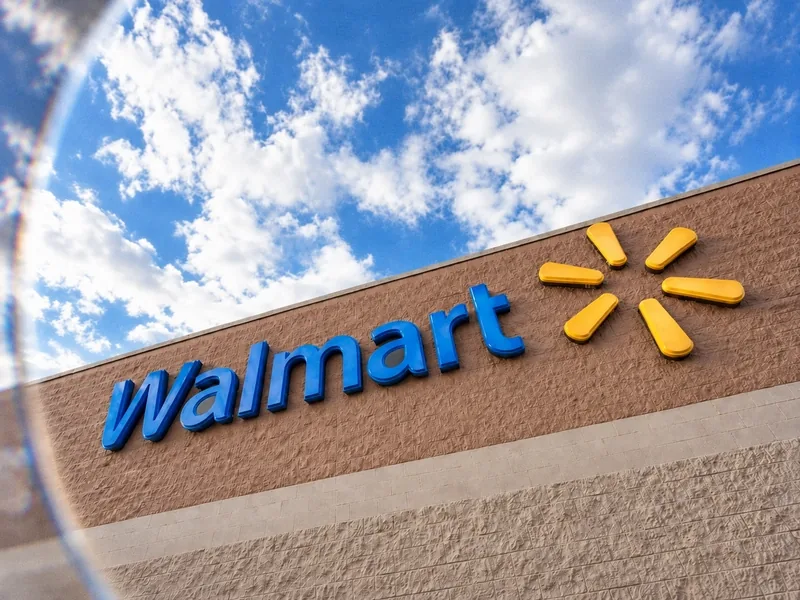 The Richmond Walmart, where the AVCC office is located — Walmart sign on a brick storefront